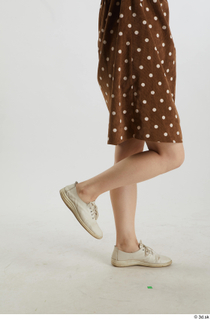 Aera  1 brown dots dress casual dressed flexing leg…